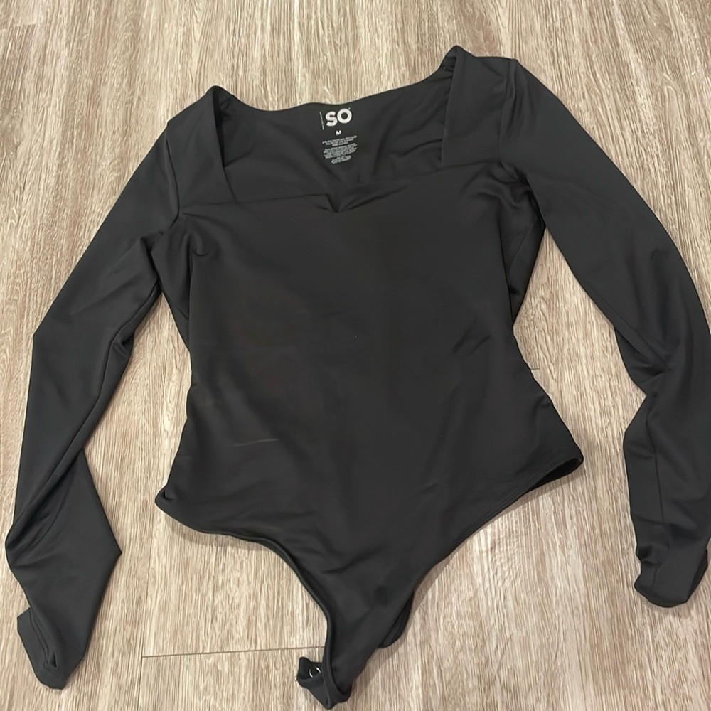 SO, size medium long sleeve body suit.